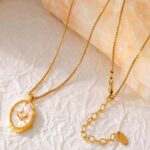 Plated Anti Tarnish Oval White Shell Pendant With Zircon