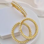 White Gold Tone Pearl Bangles